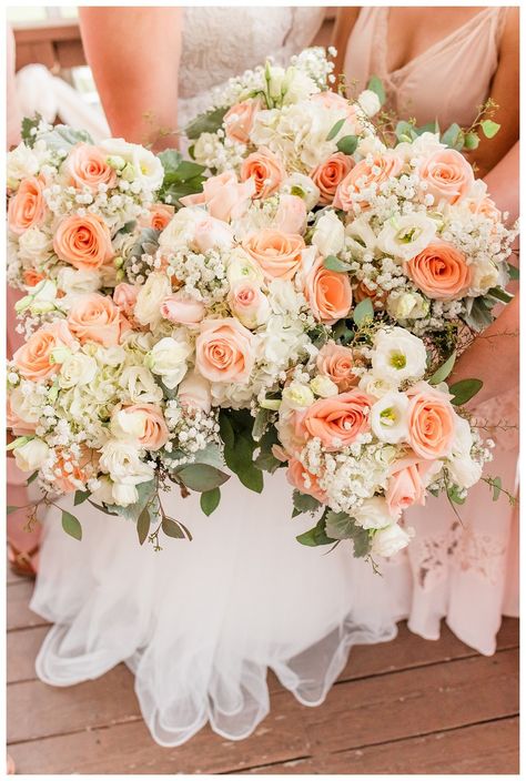 Peach and white wedding flowers #peach #whiteroses #peachwedding Coral Peach And Gold Wedding, Coral Pink White Wedding Flowers, White Peach Coral Wedding Flowers, Peach And Ivory Bouquet, Peach Pink And Sage Wedding, Wedding Flowers Peach And White, Coral And White Bouquet, Peach Colored Wedding Theme, Peach And White Floral Arrangements