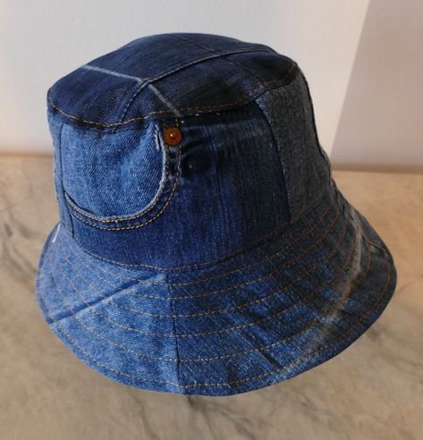 9. Blue jeans bucket hat. For him or her, who want to be stylish and unike. This hat is made from upcykled blue denim. I sewn it on my lovely vintage sewingmachine. And yes, you can tell this item is handmade and quite unike.  It has a small pocket and several seams from the original fabric, wich use to be trousers. I made decorative yellow sems on this one. Inside has a canal and a cord for size adjustment. (As it is made from jeans, it will expand a bit when you use it, and be its original siz Jeans Bucket Hat, Jean Bucket Hat, Jean Bleu, Upcycled Denim, Modern Fashion, Caps Hats, Blue Jeans, Bucket Hat, Blue Denim