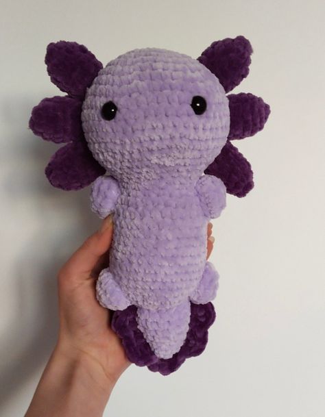 Crochet purple axolotl plushie handmade How To Make A Crochet Axolotl, Crochet Purple Animal, Cute Crochet Axolotl, How To Crochet A Axolotl, Crochet Projects Purple, Crochet Purple Plushie, Purple Crochet Animals, Cute Plushies To Crochet, Purple Crochet Plushies