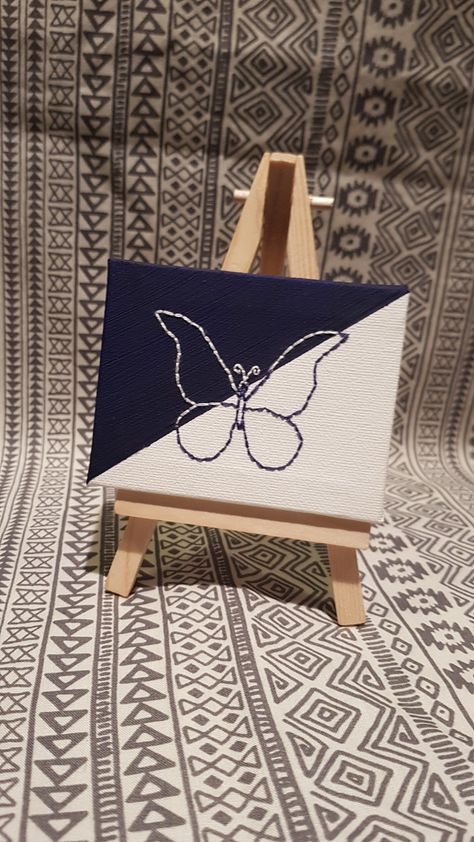 9x7cm Dark Blue Butterfly Embroidered Canvas With Easel (15x9cm), made by myself using acrylic paint and embroidery thread.  Please message me if you have any questions:) Hand Embroidery On Canvas, Paint And Embroidery, Dark Blue Butterfly, Canvas Stitching, Stitched Canvas, Embroidered Canvas, Canvas Painting Designs, Thread Painting, Painting Designs