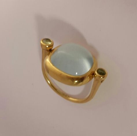 Aquamarine cabochon set in 22k solid gold swivel ring Aquamarine Gold Ring, Swivel Ring, Aquamarine Cabochon, 22k Gold Ring, Wire Wrap Jewelry Designs, Grunge Jewelry, Tourmaline Jewelry, Aquamarine Jewelry, Gemstone Cabochons