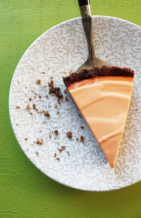 Thai Tea Cheesecake with Chocolate Crumb Crust from The Heart of the Plate by Mollie Katzen Thai Milk Tea Cheesecake, Thai Tea Cheesecake, Chocolate Crumb Crust, Tea Cheesecake, Custard Pies, Cheesecake With Chocolate, Crumb Crust, Thai Milk Tea, Chocolate Crumbs