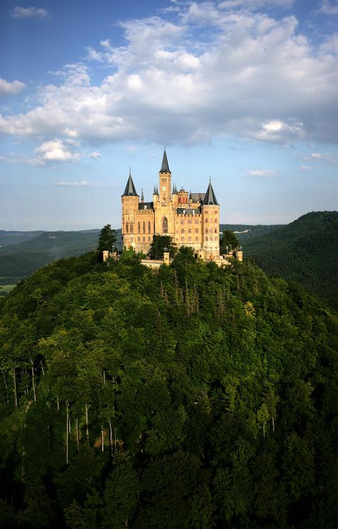 Hohenzollern Castle, one of the most impressive fortresses in Germany, is perched on a hilltop in the Swabian Mountains. It looks like a fairytale castle from centuries ago, but it is actually a fine example of 19th-century Gothic Revival architecture. The seat of the Prussian royal family and the Princes of Hohenzollern impresses with stunning views. © Achim Mende Hilltop Castle, Hohenzollern Castle, Gothic Revival Architecture, Castle Mansion, Revival Architecture, French Castles, Germany Castles, Gothic Revival, Castle In The Sky