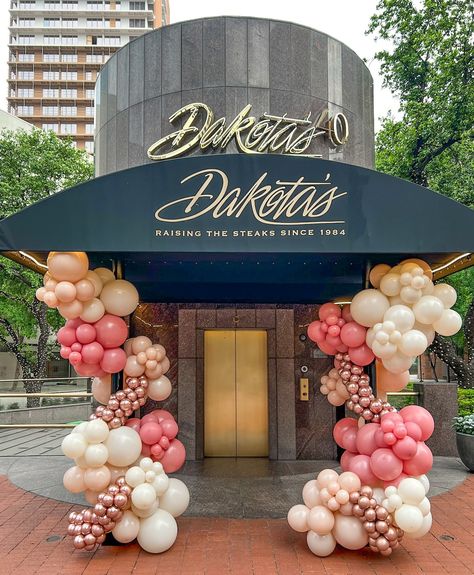 Adding a pop of fun and festivity to one of our favorite spots! 🎈✨ The balloons wrapping around the entrance pillars, create a warm and welcoming vibe. 🥰 Any Guesses on this color combination? Front Door Balloon Garland, Entrance Balloon Decoration, Balloon Organization, Grand Opening Decor, Entrance Pillars, Balloon Entrance, Balloons Bouquet, Corporate Events Decoration, Balloon Ideas