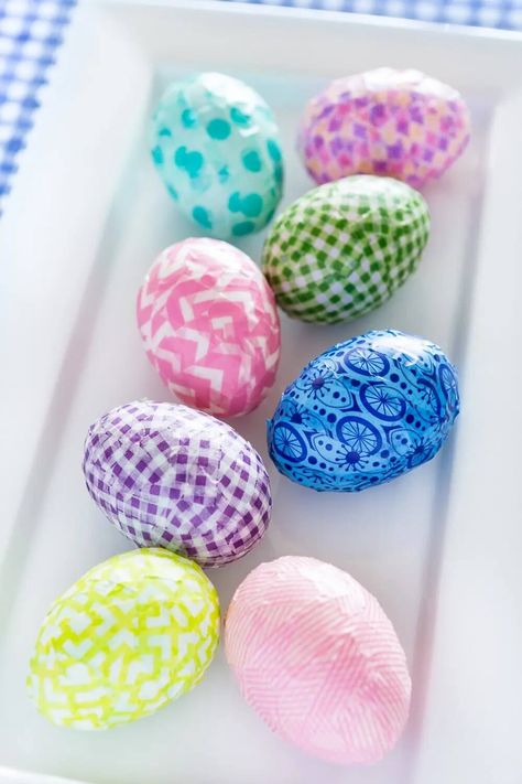 Easter Egg Decoration Craft Using Washi Tape Check more at https://www.kidsartncraft.com/easter-egg-decoration-craft-using-washi-tape/ Ways To Decorate Easter Eggs, Life Budget, Easter Decor Ideas, Diy Decorating Ideas, Easter Egg Dye, Easy Easter Decorations, Plastic Easter Eggs, Easter Egg Crafts, Easter Basket Diy