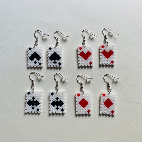 - This is a listing for a pair of Cute Perler bead Card Earrings - 4 Cards to choose from (Hearts, Diamonds, Spades, or Clubs) - You can also choose if you want golden earring hooks or silver earring hooks  -Earrings are also light weight and not heavy on the earlobe  - Earring hooks are hypoallergenic, and do not contain lead or nickel  - Earring backings are included. - Care for Earrings  - Make sure to keep earrings away from water to last longer - If water comes near them. Just dry them carefully Cute Perler, Perler Earrings, Melty Bead Designs, Card Earrings, Golden Earring, Hamma Beads Ideas, Melty Bead Patterns, Easy Perler Beads Ideas, Perler Bead Templates