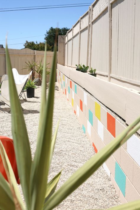 mid century yard landscape exterior painted mosaic cinderblock cinder block brick retaining wall mural breeze blocks Outside Landscaping, Mid Century Yard, Cinder Block Ideas, Breeze Wall, Fences Ideas, Breeze Block Wall, Cinder Block Walls, Breeze Blocks, Stamped Concrete Patio