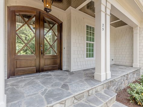 Flagstone porch and beautiful doors by Horizon Custom Builders stained in Minwax Jacobean Flagstone Porch, Front Porch Stone, Stone Porches, Front Walkway, Stone Steps, Building A Porch, Flagstone Patio, Porch Flooring, Front Patio