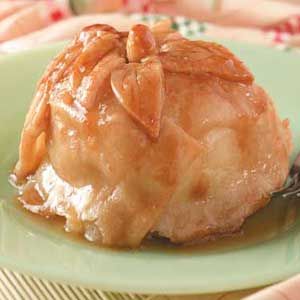 Apple Dumplings with Sauce Ingredients 3 cups all-purpose flour 1 teaspoon salt 1 cup shortening 1/3 cup cold water 8 medium tart apples, peeled and cored 8 teaspoons butter 9 teaspoons cinnamon-su... Dutch Apple Dumplings, Apple Dumpling, Dutch Apple, Apple Dumplings, Amish Recipes, Dutch Recipes, Dumpling Recipe, Baked Apples, Taste Of Home