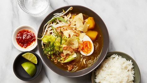 Vegetarian Soto Ayam Recipe | Epicurious Soto Ayam Recipe, Vegetarian Asian, Asian Soups, Cellophane Noodles, Soft Egg, Fried Shallots, Vegetarian Soup, Sliced Potatoes, Spice Blends