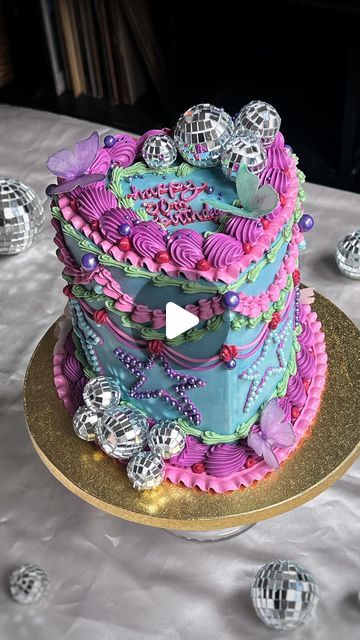 ALI GALA | VINTAGE CAKES on Instagram: "Had the most fun with this 13 Going On 30 cake! Inspired by ~the dress~ 🦋❤️  Over-the-top vintage cake with all the early 2000s bells & whistles. Featuring butterflies, disco balls, & hand-placed pearl stars. Seriously had a ball rewatching this movie & decorating this beauty!!!   #discosugar #13goingon30 #birthdaycake #birthdaypartyideas #rochesterny #rocny #vintagecake #cakeinspo" 2000s Themed Cake, 13 Going On 30 Decorations, 30 Flirty And Thriving Cake, 2000s Cake Ideas, 13 Going On 30 Cake, 13 Going On 30 Party Theme, Disco Party Cake, 13 Going On 30 Party, Birthday Disco