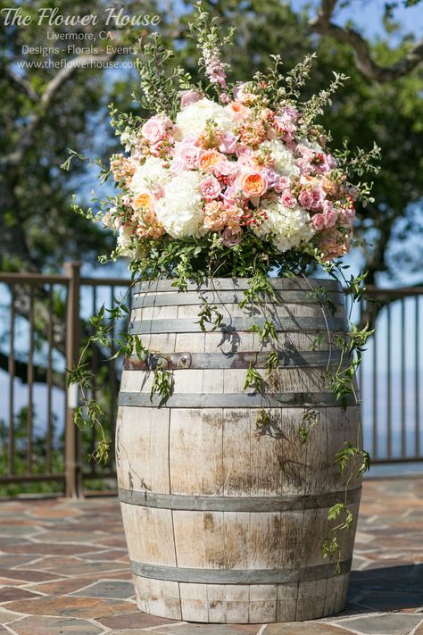 Barrel arrangement in white, pink, and peach. Barrel Flower Arrangements, Wine Barrel Flower Arrangements, Wine Barrel Wedding, Quince Decor, Flowers Wine, Table Arrangements Wedding, Outdoor Wedding Inspiration, Wine Barrels, Arrangement Ideas