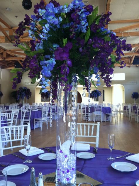 purple Blue And Purple Table Flowers, Royal Blue And Purple Centerpieces, Blue And Purple Flower Centerpieces, Navy Blue And Purple Wedding Centerpieces, Galaxy Wedding Theme Centerpieces, Royal Blue And Purple Wedding Theme, Teal Centerpieces, Priscilla Wedding, Purple Flower Centerpieces