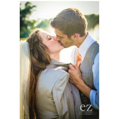 I love the way the bride is wearing the suit coat, and the groom is grabbing it barley the collar, kissing her passionately Grabbing Collar Pose, Duggar Family Blog, Celebrity Events, Jill Duggar, Duggar Wedding, Dugger Family, Pretty Photography, Duggar Family, 19 Kids And Counting