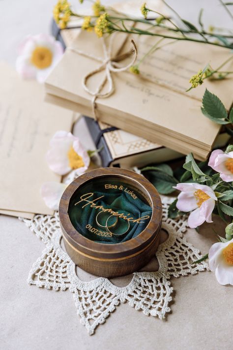 Engagement Wood Ring Box, Wedding Gift For Couple, Personalized Round Ring Box For Wedding Ceremony For Ring Bearer, Silver Or Gold Engraving Handmade round case for wedding rings can safely store your special jewels. It is a good keepsake with perfect craftsmanship * The base: natural tinted wood * The filling: velvet in different colors (white, ash gray, poppy orange, passion red, chocolate) or ivory-colored lace or pine green jacquard. * Cover: the lid holds well because of magnets. * Letteri Wood Ring Box Wedding, Engagement Box, Personalized Ring Box, Ring Box Wedding, Wedding Gift For Couple, Personalized Wedding Rings, Red Chocolate, Wood Ring Box, Wooden Ring Box