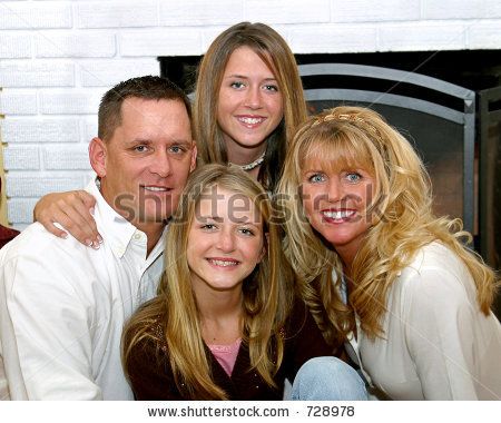 stock photo : A beautiful, happy family gathered in front of the fireplace Family Pics In Front Of Fireplace, Family At Home, Family Christmas Pictures, Family Picture Poses, Indoor Photography, Family Ideas, Christmas Family Photos, Christmas Photography, Family Pics