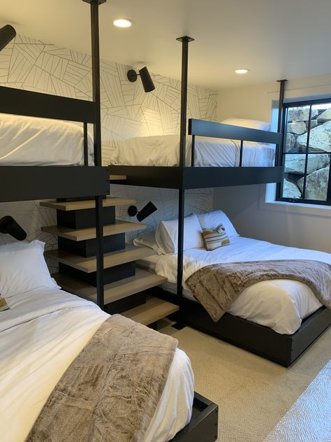 Three Beds One Room, Slanted Ceiling Bunk Beds, Contemporary Bunk Room, Guest Bedroom For Multiple People, Built In Bunk Beds 8 Foot Ceiling, Guest Room Bunk Bed Ideas, Guest Room With Bunk Beds, Multiple Bunk Beds In One Room, Cabin Loft Bedroom Ideas