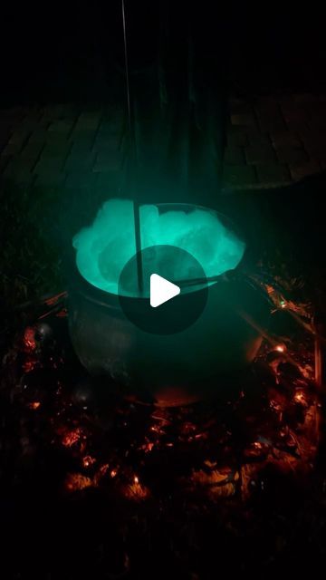 Laura Jeanne on Instagram: "DIY Witches Cauldron!  #halloween #halloweendiydecor #witchyvibes #foryou" Diy Hanging Witch Cauldron, Cauldron In Fireplace Halloween, Diy Cauldron Outdoor, Diy Witches Cauldron With Fire, Cauldron Tripod Diy, Hanging Cauldron Halloween, Cauldron Decoration Ideas Front Porch, Diy Witch Cauldron Outdoor, Diy Witches Cauldron With Lights