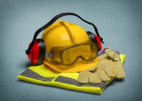 Yellow helmet with equipment on backgro... | Premium Photo #Freepik #photo #hard-hat #safety-hat #safety-helmet #engineer-hat Brain Injuries, National Safety, Medical Malpractice, Product Animation, Personal Injury Law, Health Administration, Safety Precautions, Construction Workers, Disease Control