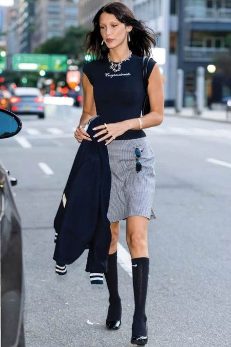 Look of the day for August 11, 2022 features Bella Hadid wearing knee-high socks with loafer pumps and a Michael Kors bag. Shop the look, here. #fashion #lookoftheday #style #womensfashion Knee High Skirt Outfits, Knee High Socks Outfit Summer, Knee Skirt Outfits, Pumps With Socks, Skirt And Knee High Socks, Knee High Skirt, Knee Socks Outfits, Long Socks Outfit, Grey Shorts Outfit