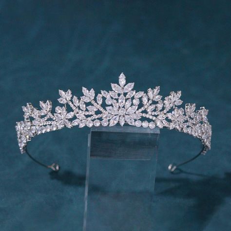 PRICES MAY VARY. ♛ Design: Interspersed with delicate shapes of leaves and flowers, the entire diadem with an undulating and beautifully balanced silhouette, reminds of an elegant princess in dancing. Wear this unique wedding tiara for bride, make you a focus in your important moment. ♛ Material: Select 5A level and top quality zirconias, not glasses, not rhinestone, the details of this princess tiara are stunning. The material is copper plated with real platinum, which provides durability and s Unique Wedding Crowns, Wedding Tiaras And Crowns, Princess Tiara Aesthetic, Wedding Hair With Crown And Veil, Tiaras And Crowns Princesses, Bridal Crown And Veil, Homecoming Princess, Wedding Diadem, Silver Crowns