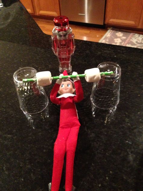 Elf on a shelf weight lifting Elf On The Shelf Working Out, Elf On The Shelf Lifting Weights, Elf On The Shelf Wire Arms, Gymnastic Elf On The Shelf, Elf On The Shelf Action Figures, Elf On A Shelf, Elf Activities, Lifting Weights, A Shelf