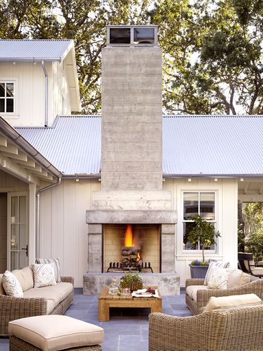 Lauren Leonard Interiors Fireplace Sitting Area, Farmhouse Exterior Design, Modern Farmhouse Exterior, House Hunters, Hus Inspiration, Farmhouse Exterior, Outdoor Fireplace, Outdoor Rooms, A Fire