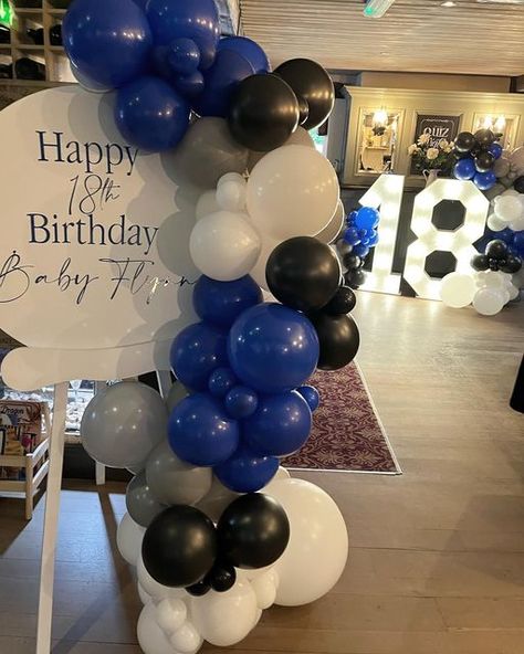 A Lister Events | Preston on Instagram: "EIGHTEEN 💥 Perfect party package to celebrate Flynn’s 18th Birthday @ploughgrimsargh 🎈 Easel display • Light up numbers • table clusters using all @sempertex colours >> swipe for all the pics >> 🎉Message us to book your party balloons today 🎉 • #18thbirthday #18thballoons #18thbirthdayparty #easeballoons #prestonballoons #lightupnumbers #balloonarch #balloongarland #blueballoons" 18th Birthday Party Ideas For Boys, 18th Birthday Decorations For Boys, 18th Birthday Boy, 18th Birthday Balloons, Large Party Decorations, Baloon Garland, Light Up Numbers, Boy 16th Birthday, 18th Birthday Party Themes