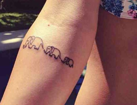 Elephant trail tattoo Elephant Family Tattoo, Tiny Elephant Tattoo, Tattoo Elephant, Small Elephant, Elephant Tattoo, Arrow Tattoos, Elephant Tattoos, Feather Tattoos, Tattoos For Daughters