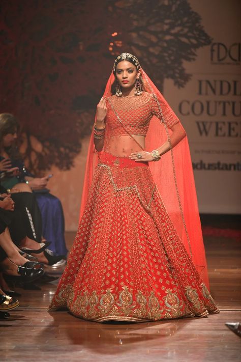 Tarun Tahiliani at India Couture Week 2019 | Vogue India Tarun Tahiliani Bridal Lehenga, Orange Bridal Lehenga, Tarun Tahiliani Saree, Tarun Tahiliani Lehenga, Tarun Tahiliani Bridal, Manish Malhotra Lehenga, Bride Lehenga, Lehenga Inspiration, Orange Lehenga