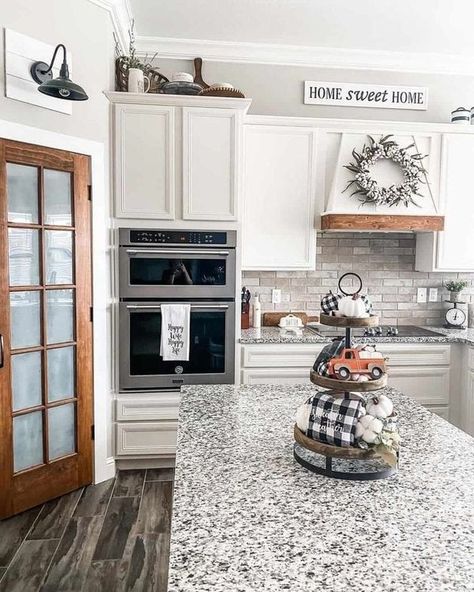 We love farmhouse | Beautiful✨️

📷 Cozyoncottonstreet | Facebook Wood Pantry Door, Agreeable Gray Walls, Gray Kitchen Backsplash, Wood Pantry, Warm Grey Paint Colors, Grey Kitchen Walls, Farmhouse Kitchen Wall Decor, Stone Tile Backsplash, Backsplash For Kitchen