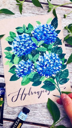 79K views · 10K reactions | Painting hydrangeas don’t have to be hard.. start with circles and add dots to paint hydrangeas in the simplest way with beautiful results👩🏻‍🎨

💙full length slowed video with directions for subscribers💙

7 years ago, I planted a small pot of blue hydrangeas and since then they have been blooming yearly… this year due to acidity of my soil, the blooms all turned purple and pink… so I added some acid to the soil hoping the flowers will return to the blue.  What color are your favorite hydrangeas?

⚡️Materials: (all supplies listed in bio under my new Amazon storefront)⚡️
Size 0 detail brush @goldenmapleart 
Size 4 round brush  @artegria 
Multimedia black paper cut into 5x7 @strathmoreart 
Gouache paints @artezaofficial 
Black calligraphy pens @ohuhuart 

Alwa Paint Hydrangeas, Painting Hydrangeas, Gouache Paints, Black Calligraphy, Blue Hydrangeas, Round Brush, Amazon Storefront, Calligraphy Pens, Blue Hydrangea