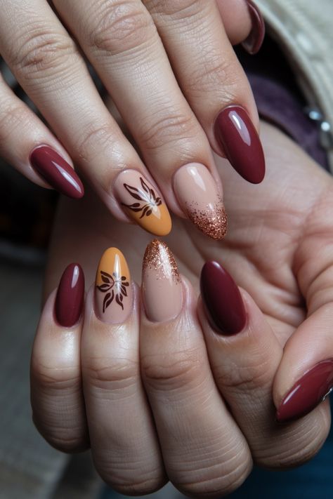 Embrace the essence of autumn with these cozy fall nail ideas that blend rich, warm hues and intricate designs. Picture deep burgundy and mustard yellow shades adorned with delicate leaf patterns that mirror the beauty of falling leaves. These stunning nails will elevate your style and capture the spirit of the season, perfect for cozy gatherings or festive celebrations. Get ready to turn heads this autumn! Fall Leaves Manicure, Fall Leaf Nails Autumn Leaves, Pastel Nail Art, Fall Nail Ideas, Stunning Nails, Festive Nail Art, Nail Color Trends, Dip Nails, Leaf Patterns