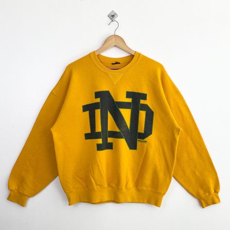 90s NCAA University of Notre Dame ‘Fighting Irish’ Crewneck Sweatshirt Print Logo Yellow Color Men’s L by OzzyVintageShop on Etsy Sweatshirt Print, University Of Notre Dame, Logo Yellow, Sweatshirt Embroidery, Notre Dame University, College Sweatshirt, Embroidery Sweatshirt, Print Logo, Embroidery Logo