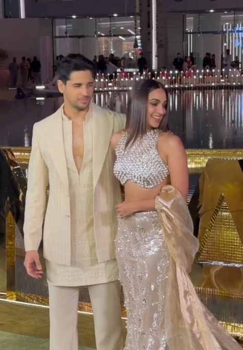 The newly-wed couple, Kiara Advani and Sidharth Malhotra made a rare joint appearance for the grand launch of the Nita Mukesh Ambani Culture Centre. Kiara looked gorgeous in a unique fishtail lehenga, and all eyes were glued to her outfit. For the unversed, Kiara and Sidharth got married in February 2023, and have been giving us couple goals after they announced they had made their 'permanent booking'.    Kiara stunned in a fishtail lehenga for the launch of the Nita Mukesh Ambani Cultur Fishtail Lehenga, Mukesh Ambani, Koffee With Karan, Cannes Red Carpet, Sidharth Malhotra, Corset Gown, Latest Bridal Dresses, Saree Gown, Cultural Centre