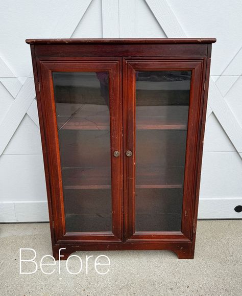 Hello, amazing friends, and welcome to our monthly Furniture Fixer Upper day! My piece for today is a really cool vintage cabinet with glass doors. I redo furniture often, but it's even more fun when I get to do it with friends. Look for their projects at the bottom! Here is how today's cabinet started: Display Cabinet With Sliding Glass Doors, Display Cabinet Upcycle Ideas, How To Change Glass Cabinet Doors, Removing Glass Doors From China Cabinet, Antique Glass Front Cabinet, Glass Cabinet Refurbish, Refinished Glass Cabinet, How To Style Cabinets With Glass Doors, Painted Glass Door Cabinet