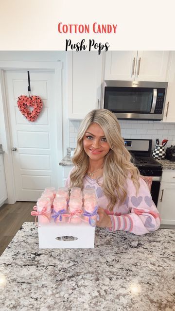 Cherish Larsen - Seasonal/Holiday Favorites! on Instagram: "Cotton Candy Push Pops 💖🎀 Im a sucker for cotton candy so I thought this was a fun idea to share! I just layered some pink and white cotton candy into the container with the candy hearts! I am using a 12 ct stand with containers here. Serve at a party, or give an individual one out with a little tag attached! Stand is just under $15! Happy Friday 🎀 Linked my VDAY outfit, containers/stand, and ribbon in LTK!" Vday Outfit, Valentine Gift Baskets, Push Pops, Candy Floss, Candy Holder, Valentine Candy, Heart Candy, Diy Box, Holiday Themes