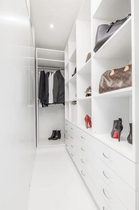 a narrow white walk in closet with railing, open storage compartments, drawers and some clothes and shoes Long Narrow Closet, Narrow Walk In Closet, Narrow Closet Design, Small Closet Design, Narrow Closet, Small Dressing Rooms, Built In Dresser, Best Room, Minimalist Closet