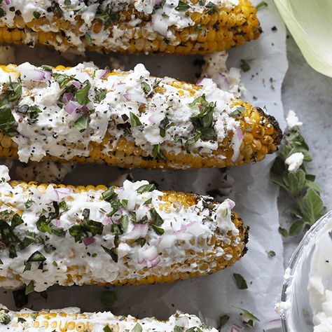 Give the classic corn on the cob a major makeover with this Grilled Mediterranean Street Corn with Feta Cheese recipe. Cleansing Recipes, Greek Yogurt Toppings, Feta Cheese Recipes, Grilling Recipes Sides, Mini Hamburgers, Fit Foodie Finds, Grilled Steak Recipes, Healthy Grilling Recipes, Fit Foodie