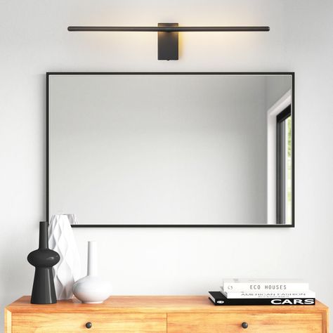 Experience the elegance of minimalism with this sleek linear black/gold integrated LED vanity light. Modern Bathroom Vanity Light, Minimalist Modern Bathroom, Bathroom Light Bar, Modern Bathroom Vanity Lighting, Vanity Lights Bathroom, Candy Factory, Vanity Lights, Bathroom Vanity Light, Basement Bathroom