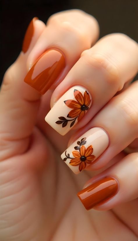 Stand out this fall with nails that blend bold colors and intricate designs. Perfect for seasonal events. Blue Nails With Orange Flowers, Fall Nail Leaf Design, Gel Nails With Flower Designs, All Nail Designs, Short Nail Designs Marble, Rust Orange Nails Design, Medium Short Nails Ideas, Nails For February And March, Spanish Style Nails