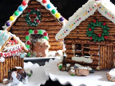 Instead of a gingerbread house this holiday season, use salty snacks to create a Holiday Pretzel Log Cabin that you can decorate with an assortment of candy adornments. Pretzel House, Decorated Pretzels, Make A Gingerbread House, Christmas Gingerbread House, 12 December, Gingerbread Houses, Christmas Goodies, Noel Christmas, Christmas Gingerbread