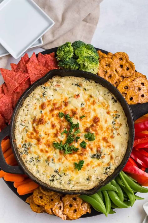 Cheesy Baked Spinach Dip Recipe 1 Creamy Cheesy Spinach Dip, Hot Spinach Dip Recipe, Slow Cooker Dip Recipes, Cheesy Spinach Dip, Party Food Favorites, Baked Spinach Dip, Holiday Appetizer Recipes, Slow Cooker Dips, Hot Spinach Dip