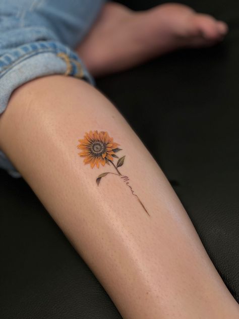 Sunflower Tattoos With Names, Sunflower Tattoo With Name In Stem, Sunflower With Name Tattoo, Small Sunflower Tattoo With Quote, Sunflower Name Tattoo, Sunflower Tattoo With Name, Sunflower Foot Tattoos, Family Tattoo Designs, Ribcage Tattoo