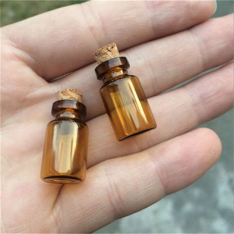 PRICES MAY VARY. Glass bottles with corks Made in China 1ML Bottles bottle with cork Glass Jars Vial empty bottle Amber bottles Capacity and size:  1ml (13x24x6mm)   Outside Diameter: 13 mm   Opening: 6mm   Quantity: you will get 100 bottles with corks   colour: Brown (Amber)  Materials: Glass Bottle With Cork   use: Crafts, Mini Glass Bottles, Empty cosmetic containers, Wedding Gift,Jars ,Vials Jar Jewelry, Brown Glass Bottles, Perfume Locket, Empty Glass Bottles, Tiny Jars, Small Glass Bottles, Glass Bottles With Corks, Mini Glass Bottles, Mini Jars