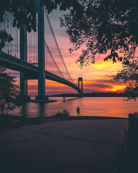 You can’t walk over the Verrazano-Narrows Bridge, but it sure is delightful to gawk at. This view from Bay Ridge at sunset is a beautiful… Bay Bridge, Time Out, Beautiful Places, Brooklyn, Bridge, Walking, New York, Canning