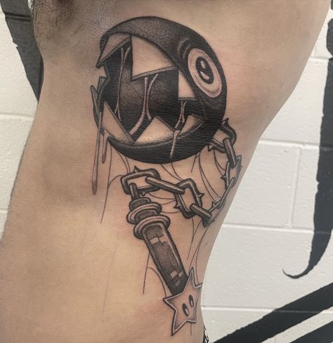 Chain chomp flail! This was a lot of fun and it’s always an honor to get to do one of my flash pieces! • • • • #chainchonp #chainchomptattoo #tattoo #ink #inked #mariotattoo #videogametattoos #inked #michigantattooers #michigantattooartist #femaletattooartist #blackandgreytattoo #blckandgrey #ribtattoo #flail #flailtattoo #tattooed #tattooer #tattooist #tattooartist #stipple #stippleshade #allegory #allegoryblak #linework Chain Chomp Tattoo, Michigan Tattoos, Chain Chomp, Video Game Tattoos, Mario Tattoo, Chain Tattoo, Female Tattoo Artists, Rib Tattoo, Stippling