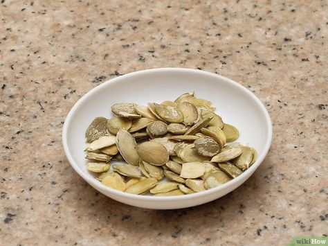 3 Ways to Shell Pumpkin Seeds - wikiHow Pumpkin Seeds Benefits, Maple Seeds, Shelled Pumpkin Seeds, Pumpkin Seed Recipes, Boiled Vegetables, Cooking Pumpkin, Maple Pumpkin, Pumpkin Seed, Nutritious Snacks