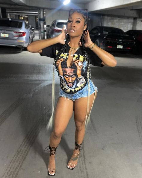 Clubwear outfit young dolph graphic tee jean shorts baddie outfit Party Outfits With Shorts, Black Graphic Tee Outfit Baddie, Brown Shorts Outfit Black Women, Graphic Tee Fits Black Women, Graphic Tee And Shorts Outfit Baddie, Party Outfit Black Women Shorts, How To Tie Graphic Tee, How To Style A Graphic Tee Black Woman, Graphic Tshirt Outfit Black Women