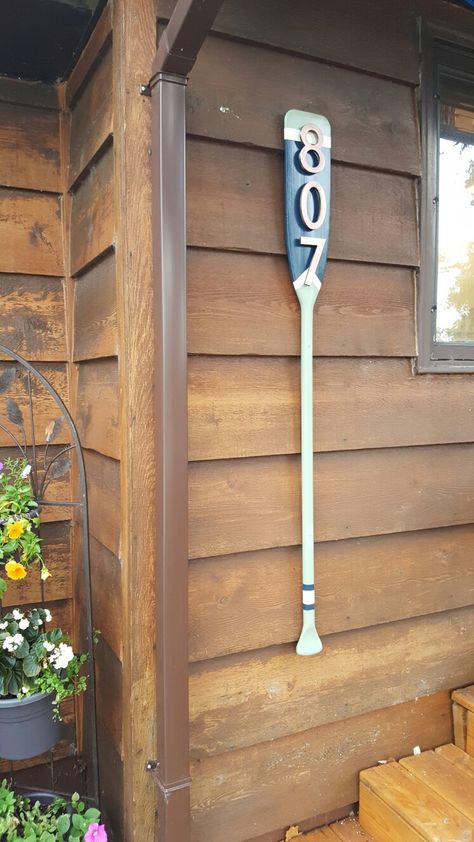 My house number project. I used an old paddle and ordered the copper numbers to match our railing caps. Dock Decor Ideas Lakeside, Lake House Theme, River Signs, Hunting Shack, Paddle Decor, Oar Decor, Lake Cabin Decor, Lakehouse Ideas, Boat Interiors